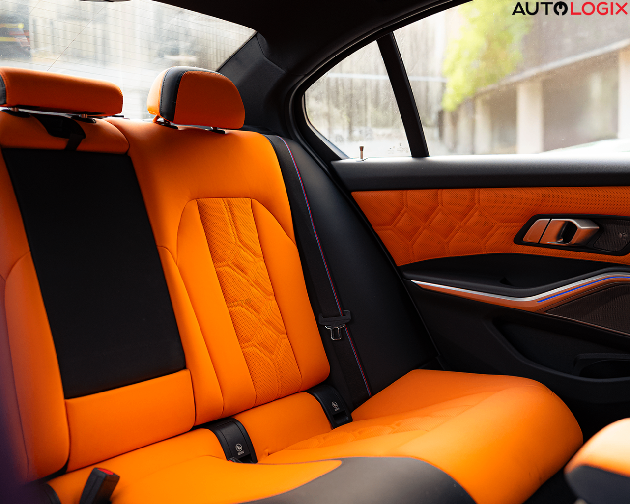 Hand-finished bespoke interior — quilted leather, contrast stitching